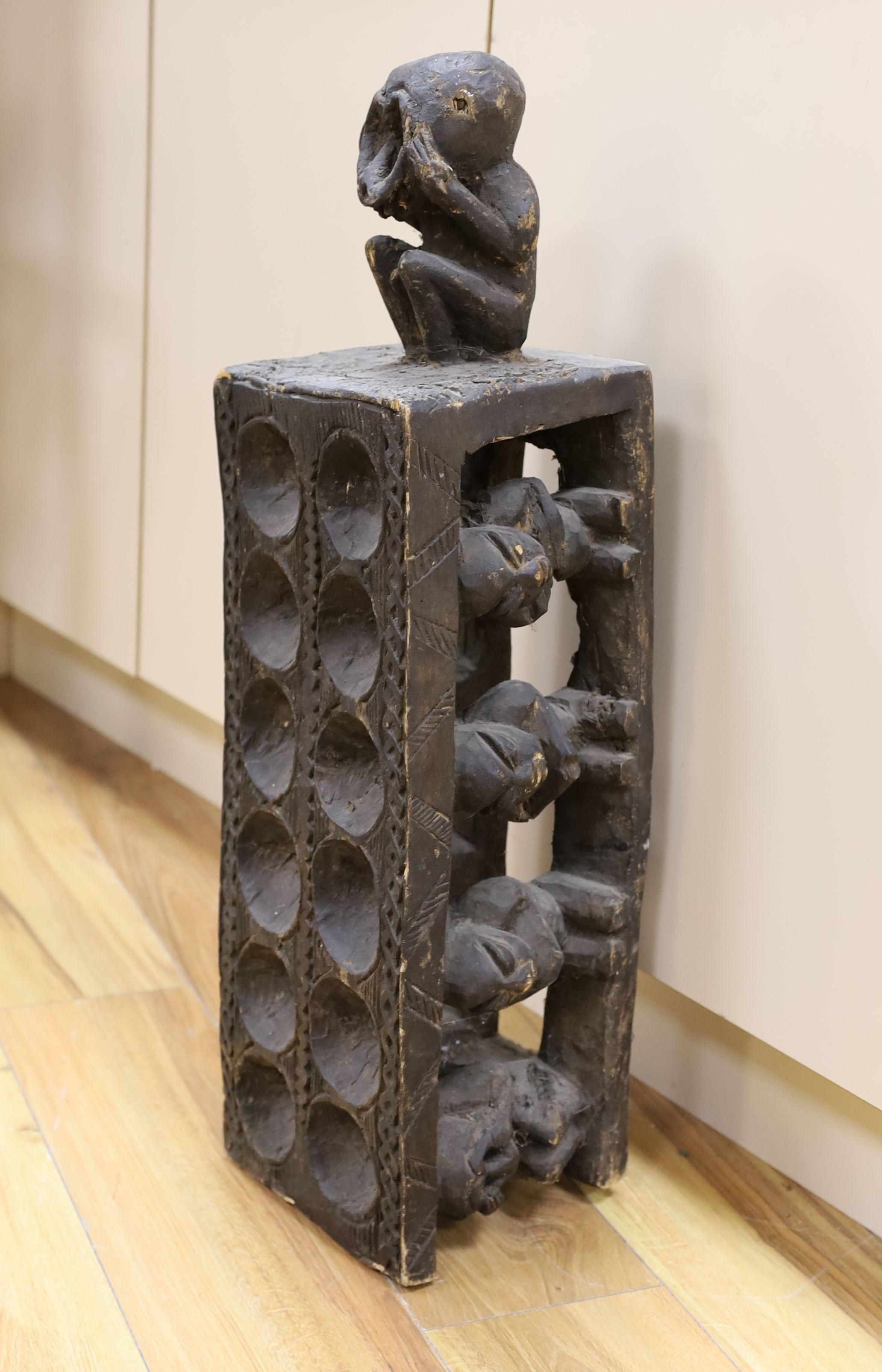 A large Nigerian carved wood amusement, 72 cms high.